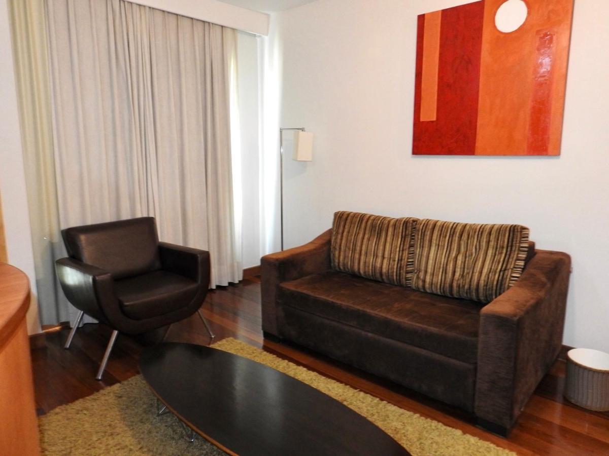 Constantino Hotel e Eventos Juiz de Fora Exterior foto A living room