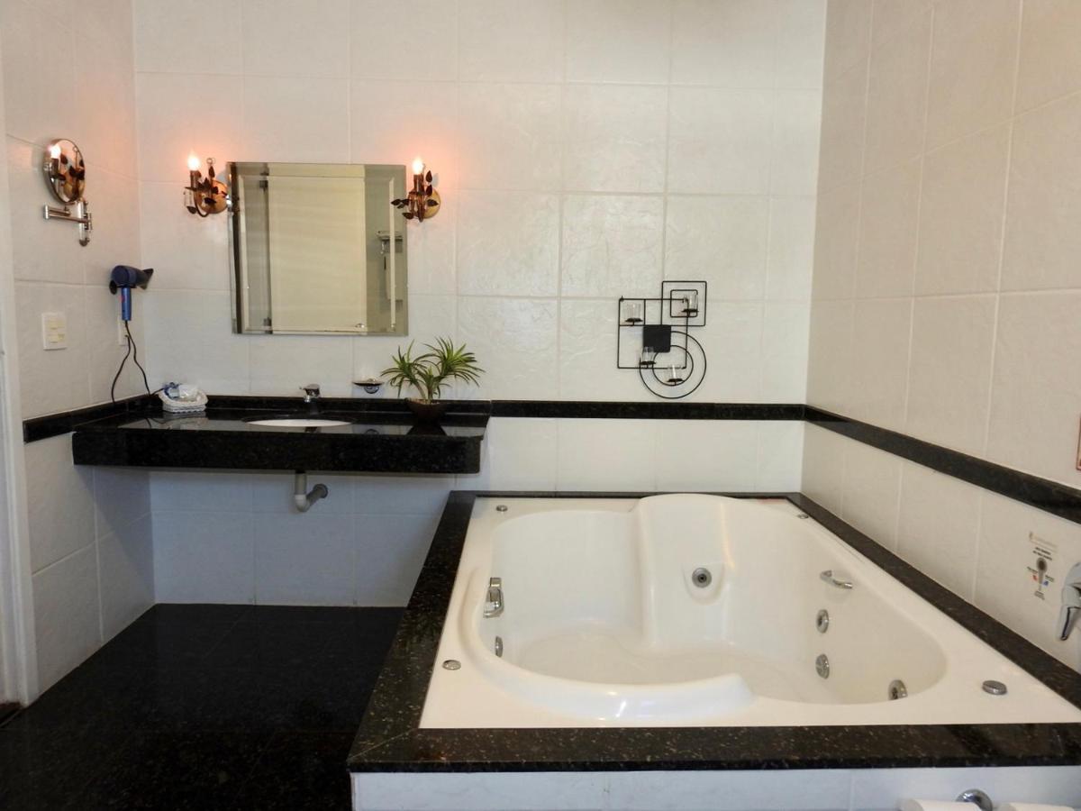 Constantino Hotel e Eventos Juiz de Fora Exterior foto A whirlpool bathtub